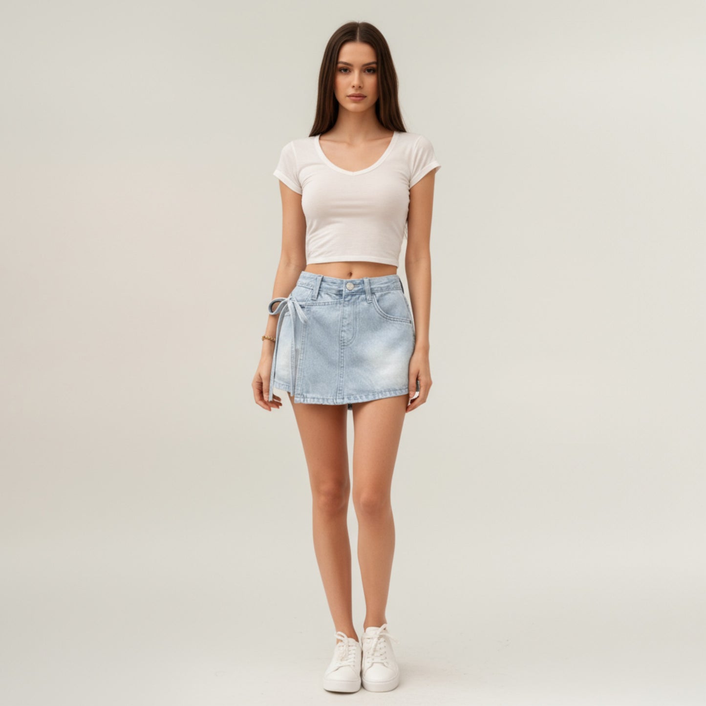 Denim Mini Skirt with Front Seam Detailing, Adjustable Side Tie Accent and Structured Fabric for a Smooth, Flattering Shape