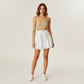 Tiered Mini Skirt with Layered Ruffle Hem and Delicate Bow Accents in Soft Lightweight Fabric