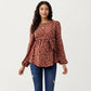 Maternity Top with Long Sleeves Soft Draped Fabric Delicate Allover Pattern and Adjustable Tie Waist for Flattering Shape