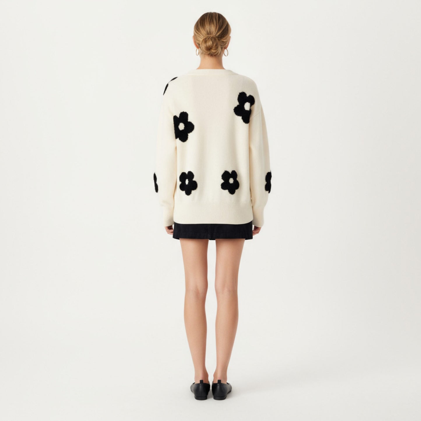 Soft Knit Button Front Cardigan with Oversized Floral Pattern Drop Shoulder Fit and Ribbed Hemline Detailing