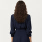 Long Sleeve Dress with Pleated Skirt Structured Wrap Front Collar Detail and Belted Waist for a Smooth Flattering Shape