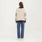 Patterned Knit Pullover Top with Textured Waffle Stitch Body, Contrast Ribbed Mock Neck, and Decorative Sleeve Detailing