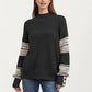 Patterned Knit Pullover Top with Textured Waffle Stitch Body, Contrast Ribbed Mock Neck, and Decorative Sleeve Detailing