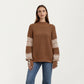 Patterned Knit Pullover Top with Textured Waffle Stitch Body, Contrast Ribbed Mock Neck, and Decorative Sleeve Detailing