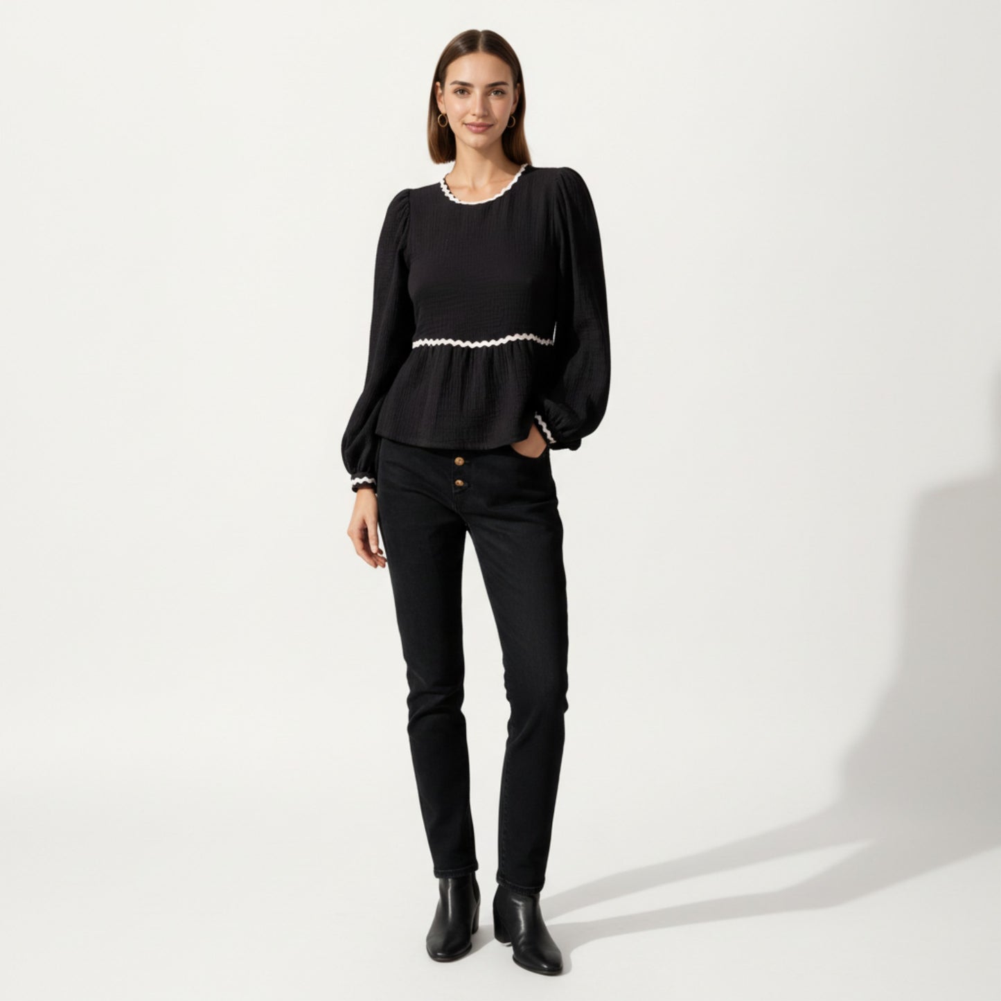 Long Sleeve Textured Peplum Top with Contrast Trim Accents and Statement Bow Detail