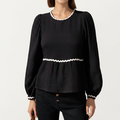 Long Sleeve Textured Peplum Top with Contrast Trim Accents and Statement Bow Detail