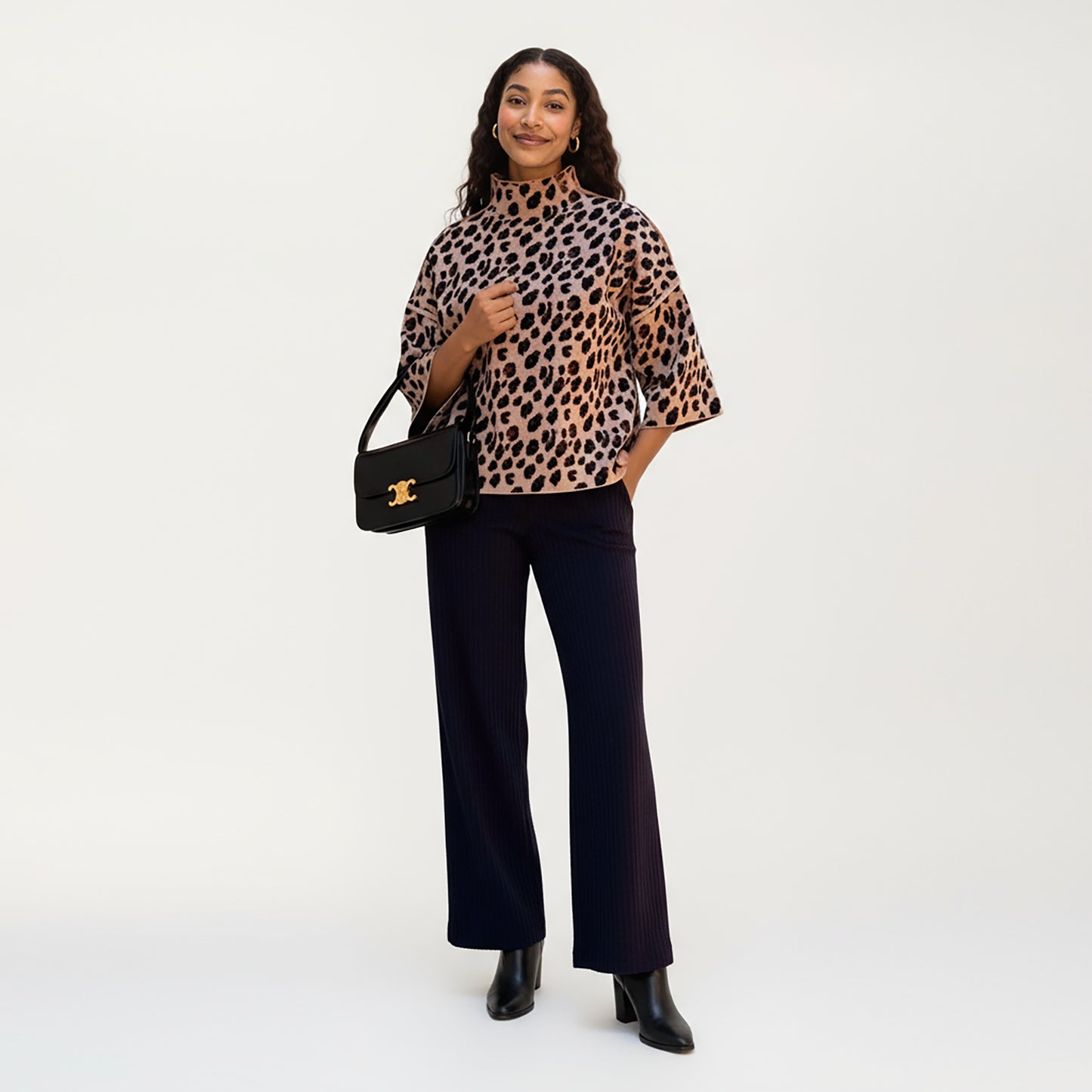 Leopard Print Knit Top with High Mock Neck, Wide Long Sleeves and Soft Textured Finish for a Relaxed, Stylish Silhouette