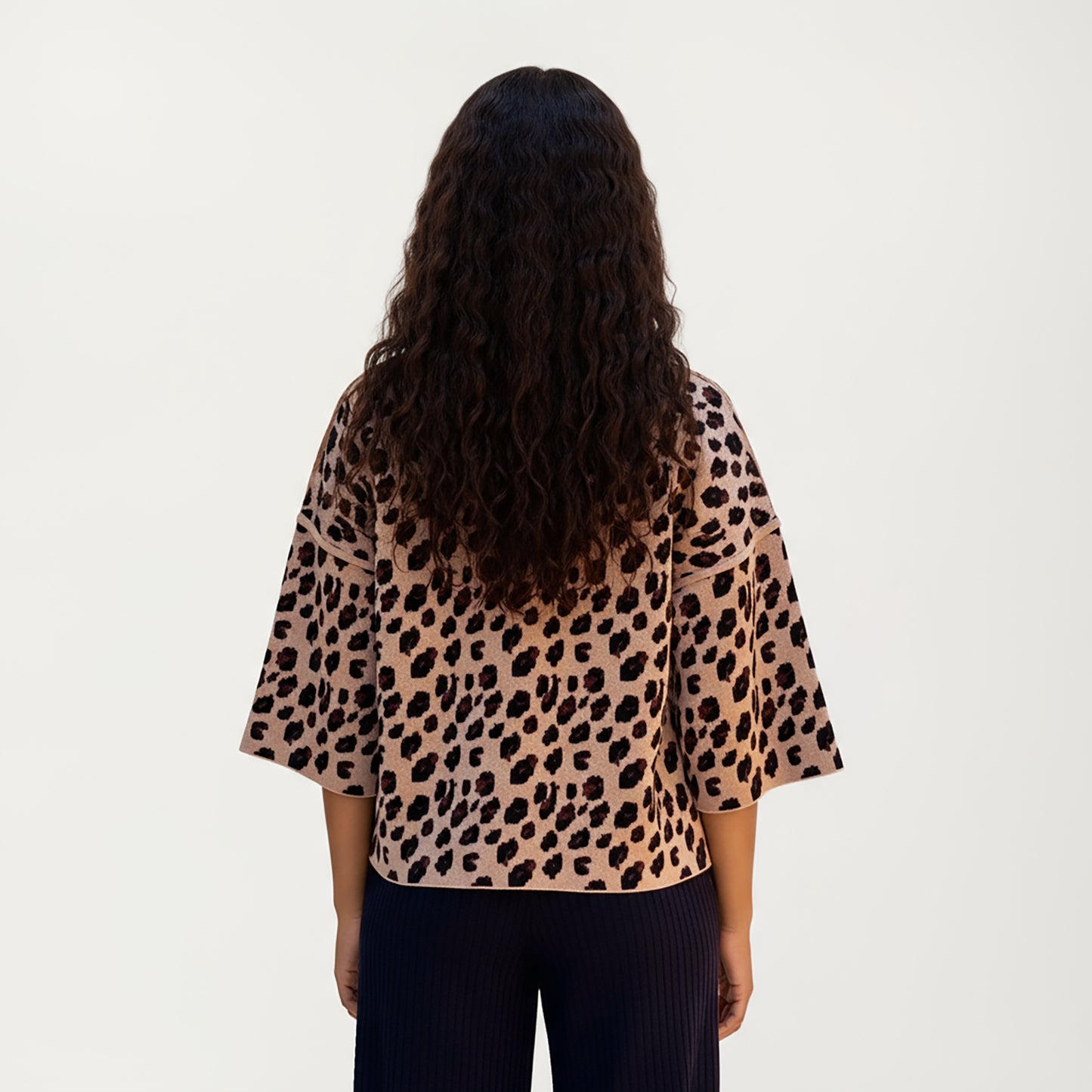 Leopard Print Knit Top with High Mock Neck, Wide Long Sleeves and Soft Textured Finish for a Relaxed, Stylish Silhouette