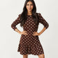 Long Sleeve Polka Dot Mini Dress with Round Neckline and Ruffled Hem Detail