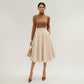 Midi A-Line Skirt with Structured High Waist, Soft Flowing Panels, and Button-Tab Pocket Accents for Shape
