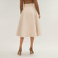 Midi A-Line Skirt with Structured High Waist, Soft Flowing Panels, and Button-Tab Pocket Accents for Shape