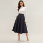 Midi A-Line Skirt with Structured High Waist, Soft Flowing Panels, and Button-Tab Pocket Accents for Shape