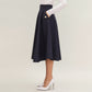 Midi A-Line Skirt with Structured High Waist, Soft Flowing Panels, and Button-Tab Pocket Accents for Shape