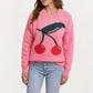 Cherry Graphic Fuzzy Knit Sweater with Textured Soft Feel Ribbed Crew Neckline and Relaxed Long Sleeve Fit