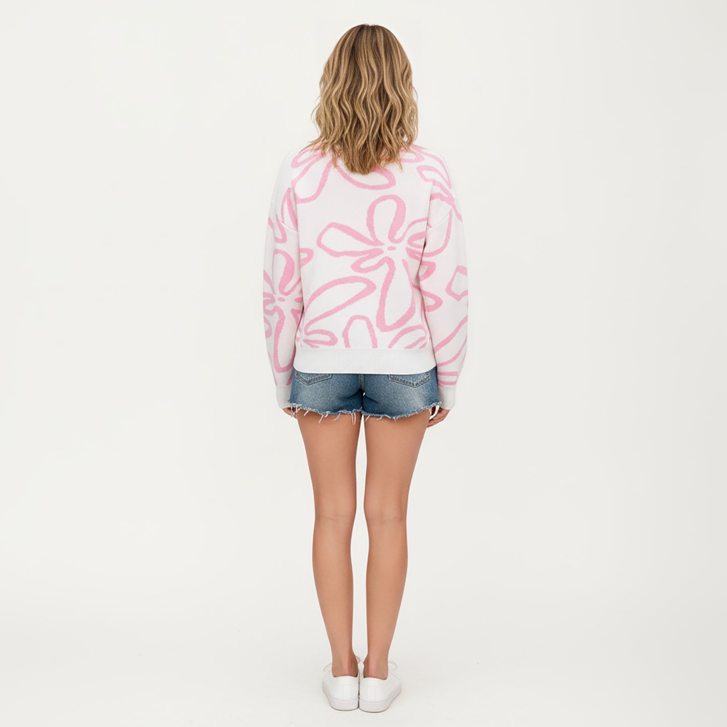 Abstract Floral Pattern Knit Sweater with Soft Crew Neckline and Relaxed Long Sleeve Pullover Design