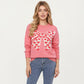 Heart Bow Knit Sweater with Playful Graphic Design, Soft Crew Neck Fit and Cozy Long Sleeve Detailing