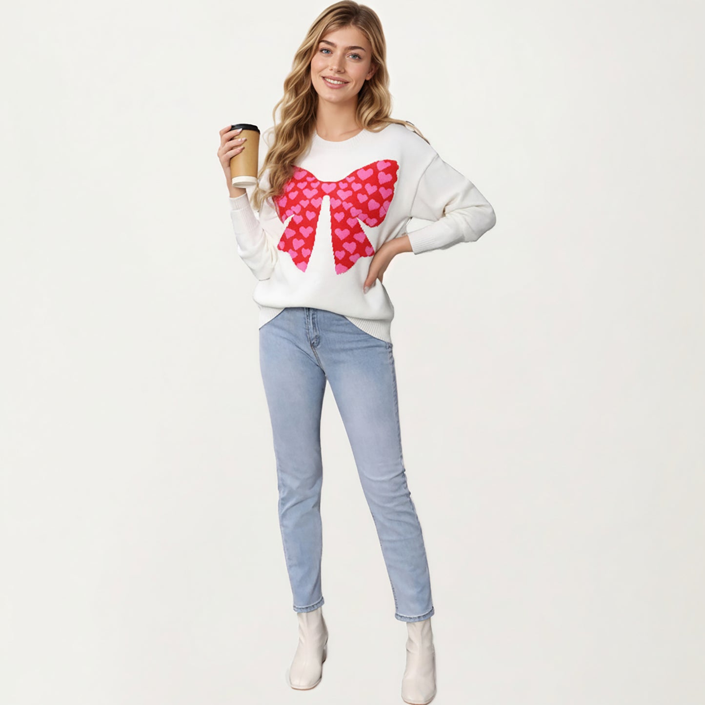 Heart Bow Knit Sweater with Playful Graphic Design, Soft Crew Neck Fit and Cozy Long Sleeve Detailing