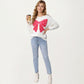 Heart Bow Knit Sweater with Playful Graphic Design, Soft Crew Neck Fit and Cozy Long Sleeve Detailing