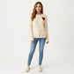 Knit Top with Textured Heart Pattern and Contrast Heart Accent Detail in a Soft Cozy Pullover Design