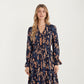 Floral Print Smocked Waist Dress with Long Sleeves, V-Neckline, and Ruffled Hem for a Feminine and Flattering Fit