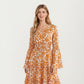Floral V-Neck Dress with Bell Sleeves and Tiered Skirt for a Flattering Fit and Elegant Style
