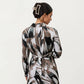 Abstract Print Long Sleeve Wrap Dress with Belt and Asymmetrical Hem for a Flattering Fit