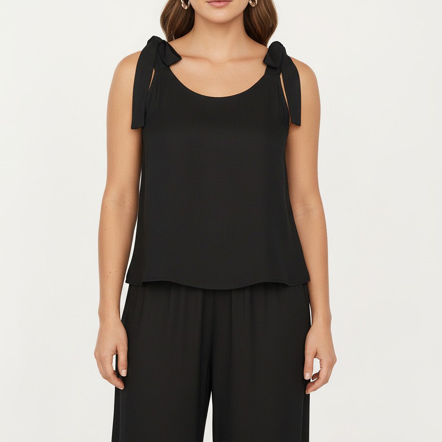 Sleeveless Wide Leg Jumpsuit with Tie Shoulder Straps Relaxed Fit Silhouette and Flowing Pants