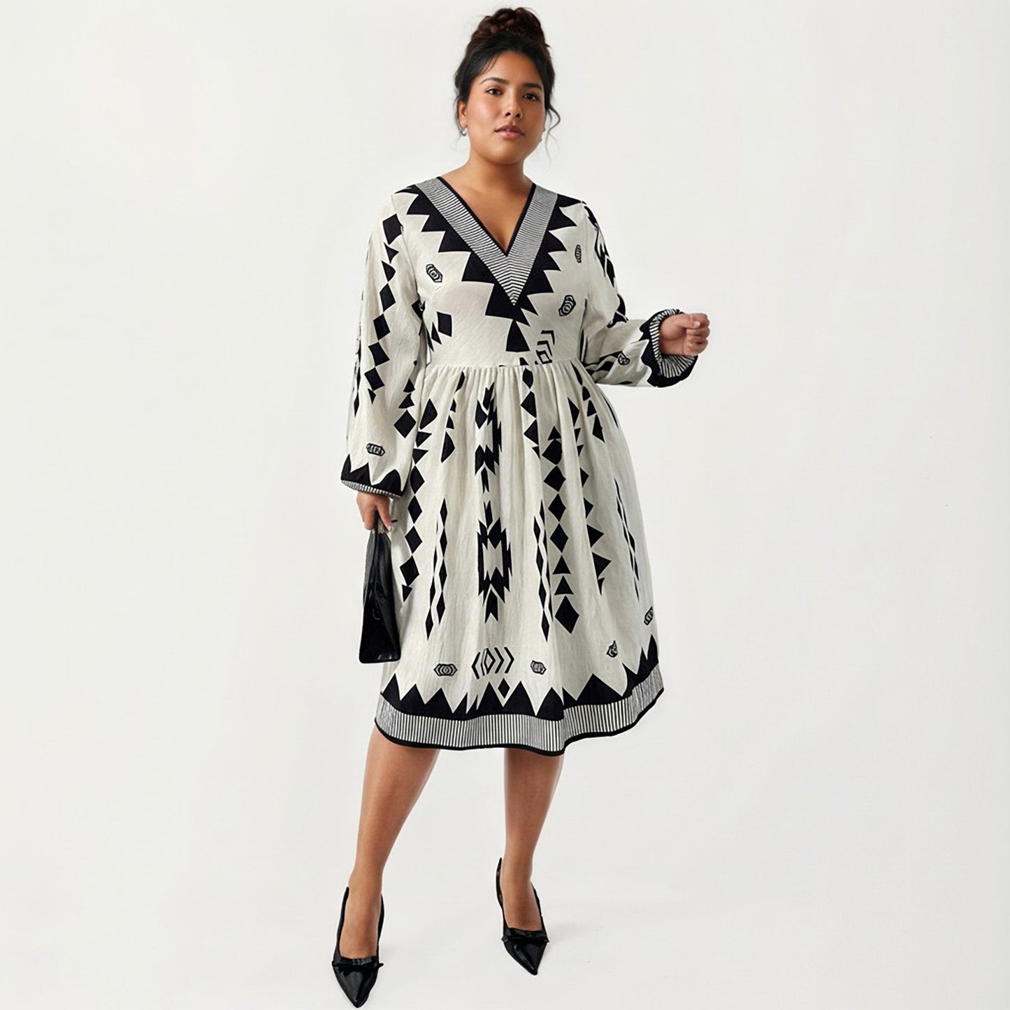 Plus Size Long Sleeve V Neck Dress with Geometric Print Border Details and Flowy Skirt