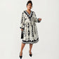 Plus Size Long Sleeve V Neck Dress with Geometric Print Border Details and Flowy Skirt