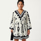 Plus Size Long Sleeve V Neck Dress with Geometric Print Border Details and Flowy Skirt