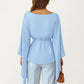 Long Sleeve Asymmetrical Top with Floral Applique and Adjustable Waist Tie