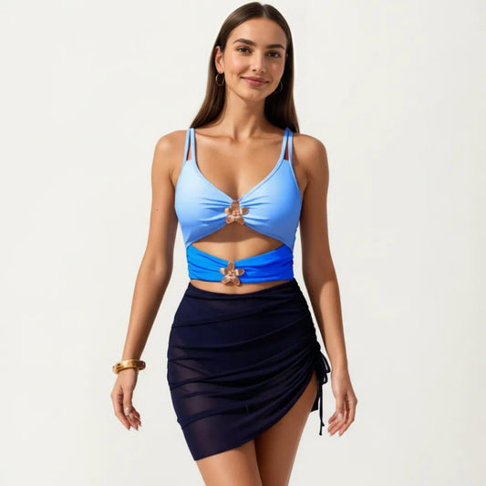 One Piece Cutout Swimsuit with Adjustable Straps Decorative Floral Hardware and Ruched Skirt Overlay