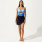 One Piece Cutout Swimsuit with Adjustable Straps Decorative Floral Hardware and Ruched Skirt Overlay