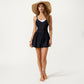One Piece Swim Romper with Contrast Neckline Adjustable Straps and Flowy Short Bottom