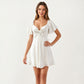 Sweetheart Twist Front Mini Dress with Flutter Sleeves Smocked Back Flowy A Line Silhouette