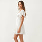 Sweetheart Twist Front Mini Dress with Flutter Sleeves Smocked Back Flowy A Line Silhouette