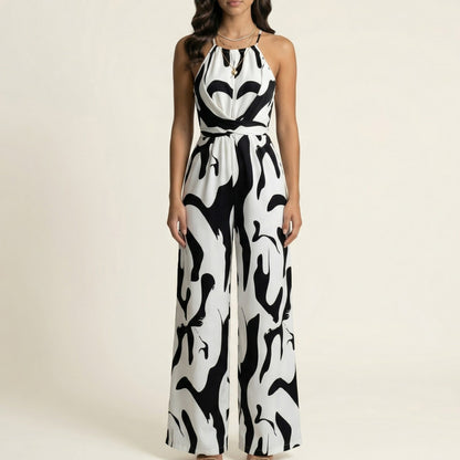 Sleeveless Printed Wide Leg Jumpsuit with Halter Neck Waist Tie Detail Relaxed Fit