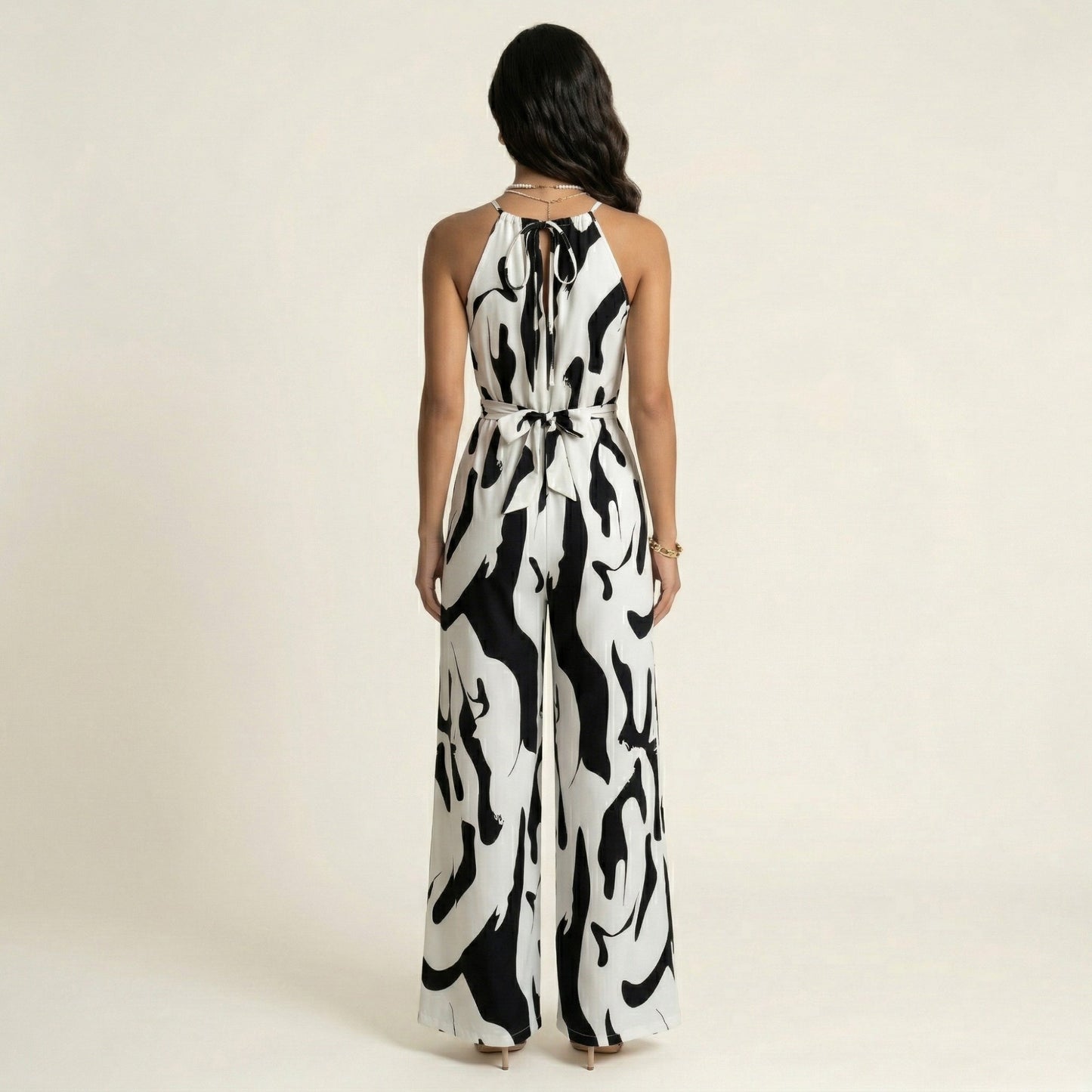 Sleeveless Printed Wide Leg Jumpsuit with Halter Neck Waist Tie Detail Relaxed Fit