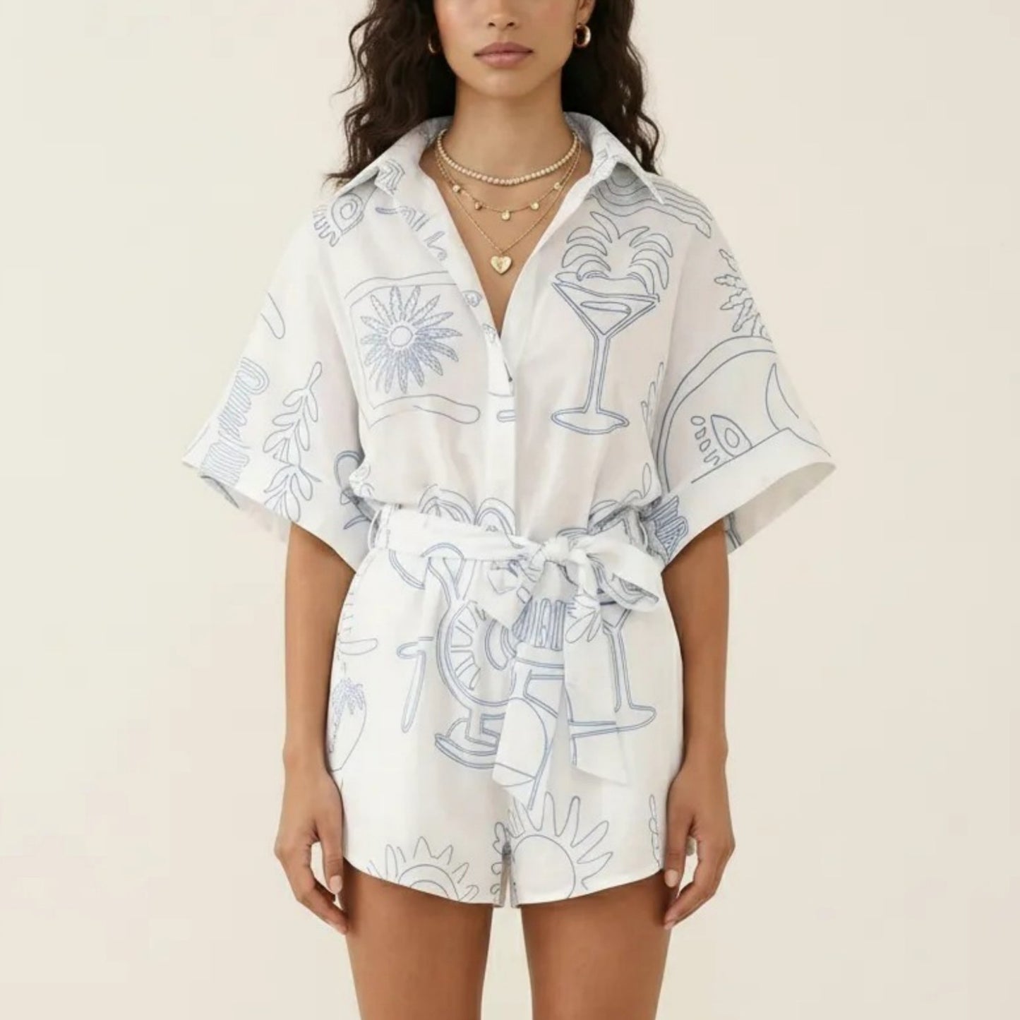 Short Sleeve Printed Romper with Collared Neckline Button Front Closure Waist Tie Relaxed Fit
