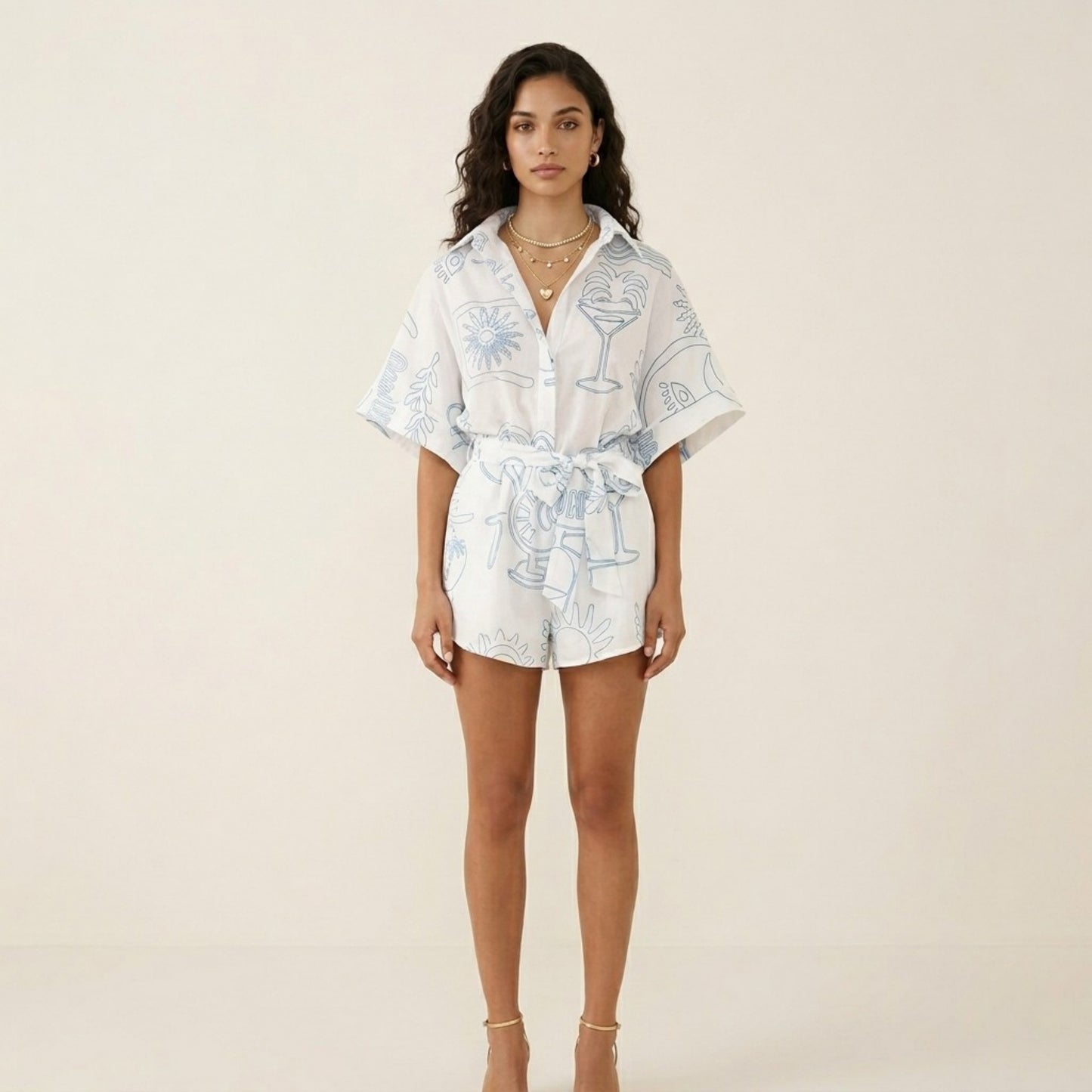 Short Sleeve Printed Romper with Collared Neckline Button Front Closure Waist Tie Relaxed Fit