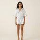 Short Sleeve Printed Romper with Collared Neckline Button Front Closure Waist Tie Relaxed Fit