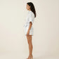 Short Sleeve Printed Romper with Collared Neckline Button Front Closure Waist Tie Relaxed Fit
