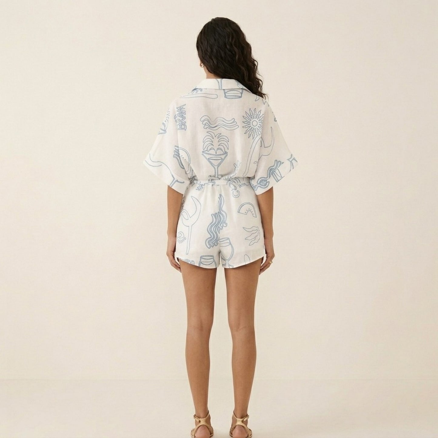 Short Sleeve Printed Romper with Collared Neckline Button Front Closure Waist Tie Relaxed Fit