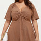 Plus Size Short Sleeve Twist Front V Neck Peplum Top with Textured Eyelet Fabric Blouse