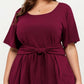Plus Size Short Sleeve Scoop Neck Top with Waist Tie Detail Flowy Peplum Hem Relaxed Shirt