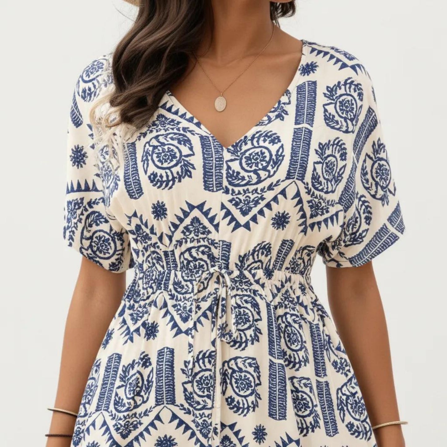 Short Sleeve Printed Midi Dress with V Neckline Drawstring Waist and Tiered Flowy Silhouette Design