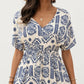 Short Sleeve Printed Midi Dress with V Neckline Drawstring Waist and Tiered Flowy Silhouette Design