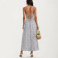 Sleeveless Floral Maxi Dress with Spaghetti Straps Smocked Waist and Flowy A-Line Silhouette Design