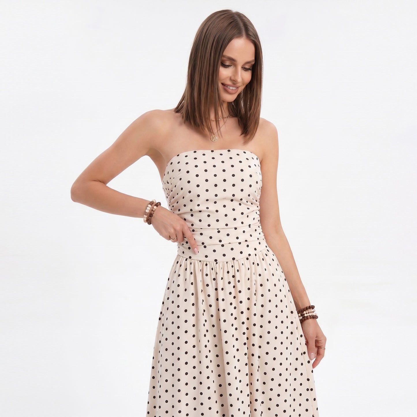 Polka Dot Strapless Maxi Dress with Ruched Bodice and Full Skirt