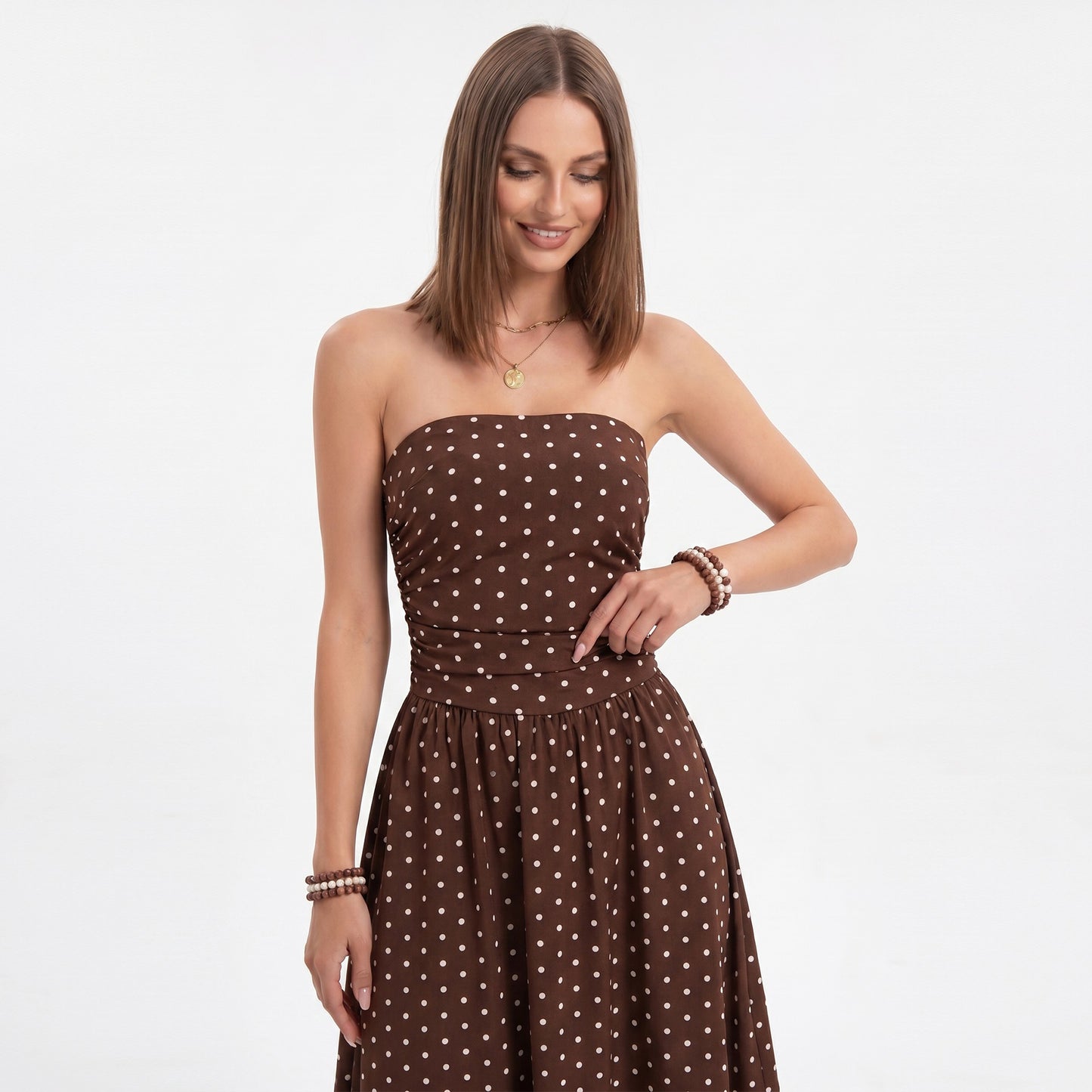 Polka Dot Strapless Maxi Dress with Ruched Bodice and Full Skirt